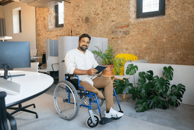 Photo of Man on a Wheelchair