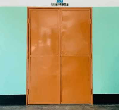 Learn about ADA compliance, design guidelines, funding, and hiring contractors for school door ramps.